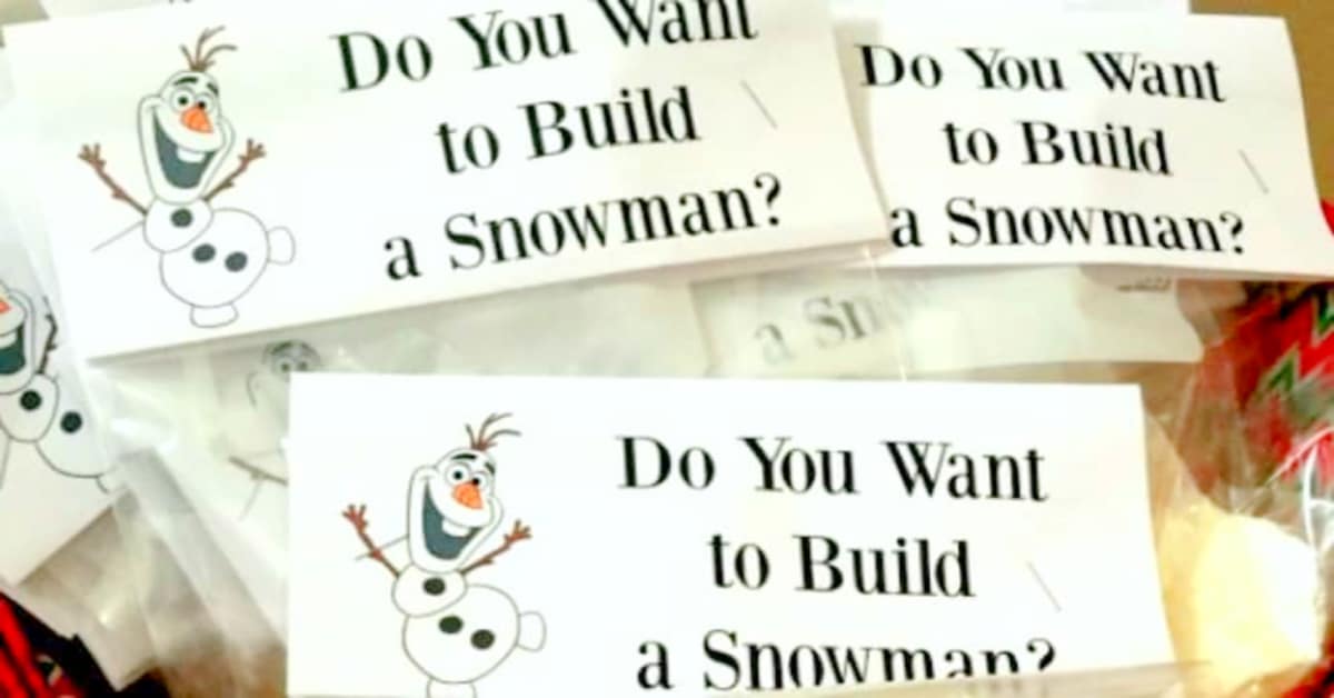 Do You Wanna Build A Snowman Treat Bags with snowman kits in a Christmas basket
