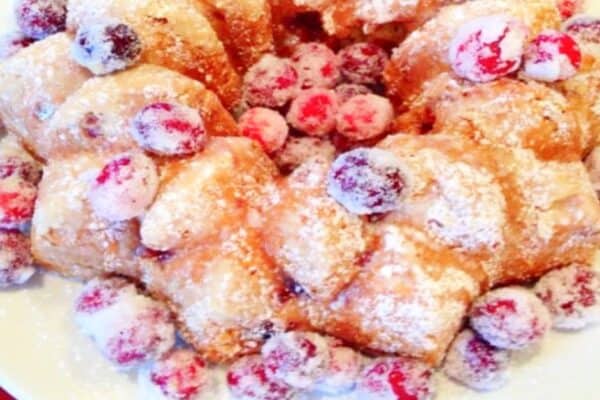 How To Sugar Cranberries with sparkly sugared cranberries on a Christmas bundt cake dessert