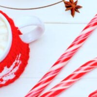 What To Do With Leftover Candy Canes (what to do with candy canes) hot chocolate and old candy canes on a white Christmas table