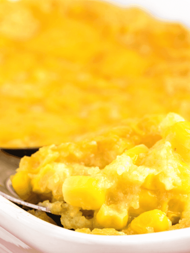 Corn casserole in the oven How To Make Corn Casserole In Slow Cooker or Oven close up of corn pudding on spoon