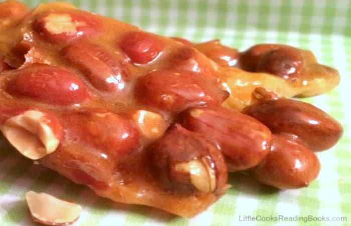 Old Fashioned Peanut Brittle Recipe on a green and white checked napkin