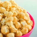 toffee popcorn in a pink bowl