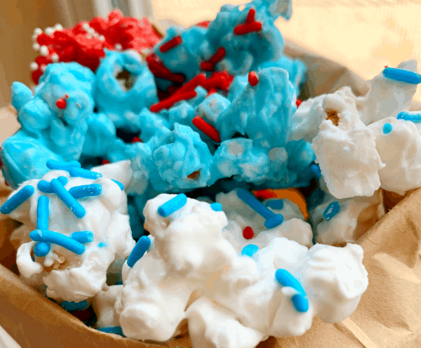 Patriotic Popcorn: white chocolate popcorn in white, blue, and red with sprinkles