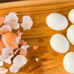 how to make the best easy peel hard boiled eggs - eggs on a cutting board