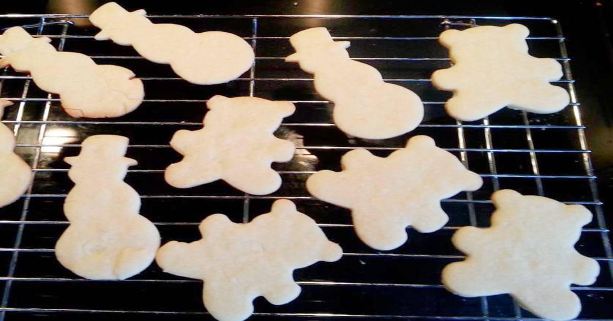 sugar cut out cookies: sugar cookie recipe to decorate cutout cookies on a wire cooling backing rack