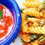 air fryer pasta snack on a plate with marinara sauce in a blue dipping dish
