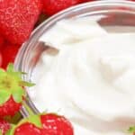 Dip Recipe For Fruit strawberries next to a bowl of fruit dip