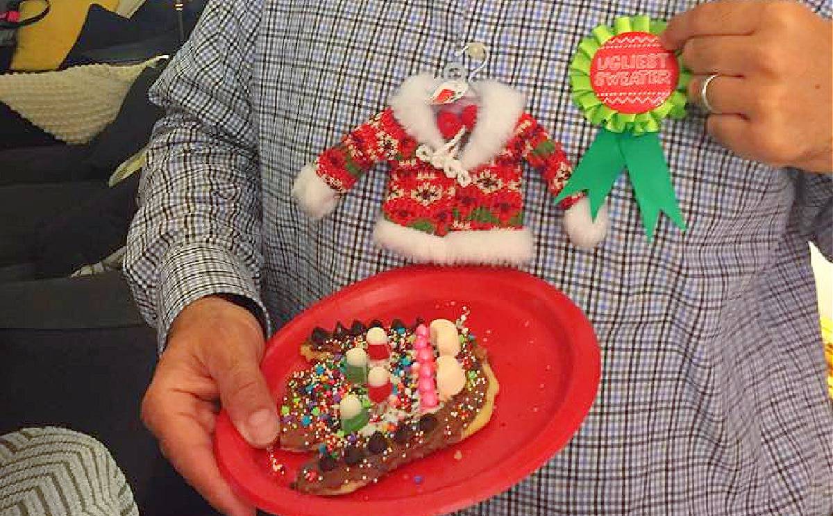 Ugly Christmas Sweater Cookie Decorating Party with ugly sweater cookie and ugly sweater ribbon