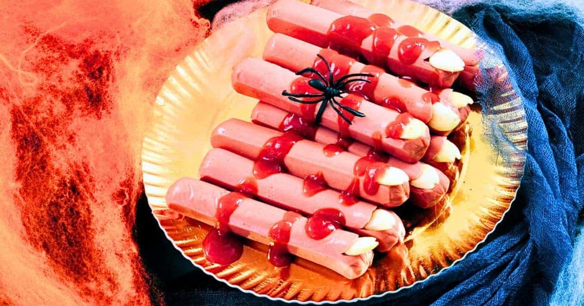 Halloween Mystery Food Game (Gross Halloween Games For Kids) - Halloween hotdogs fingers with ketchup over them for disgusting halloween party foods