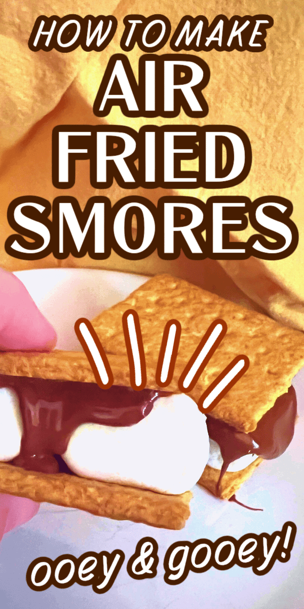 How to make s'mores in an air fryer (best s more recipe inside at home!) text over someone holding air fried smores 