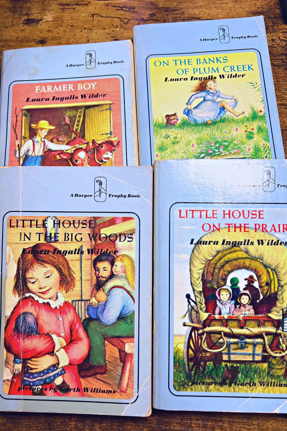 Read Little House On the Prairie Christmas Books Little House books on a table
