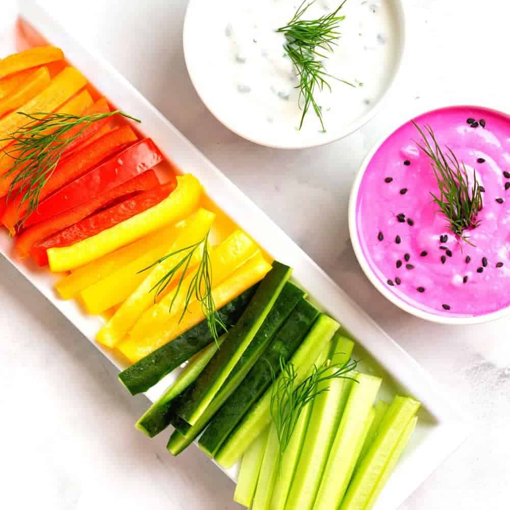 Fun healthy eating for preschool and healthy toddler snacks colorful snack plate with white and pink yogurt dipping sauces