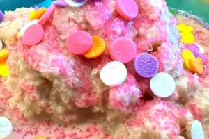 How to Make Snow Cream with Chocolate snow ice cream in dish with colored sprinkles