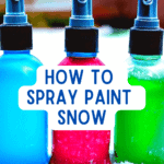 Snow Day Painting With Food Colors text over spray bottles with food coloring paint sitting in snow in a backyard