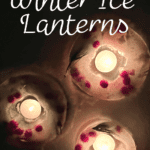 Winter Ice Lanterns text with winter ice lantern candles shining on a dark night in the snow