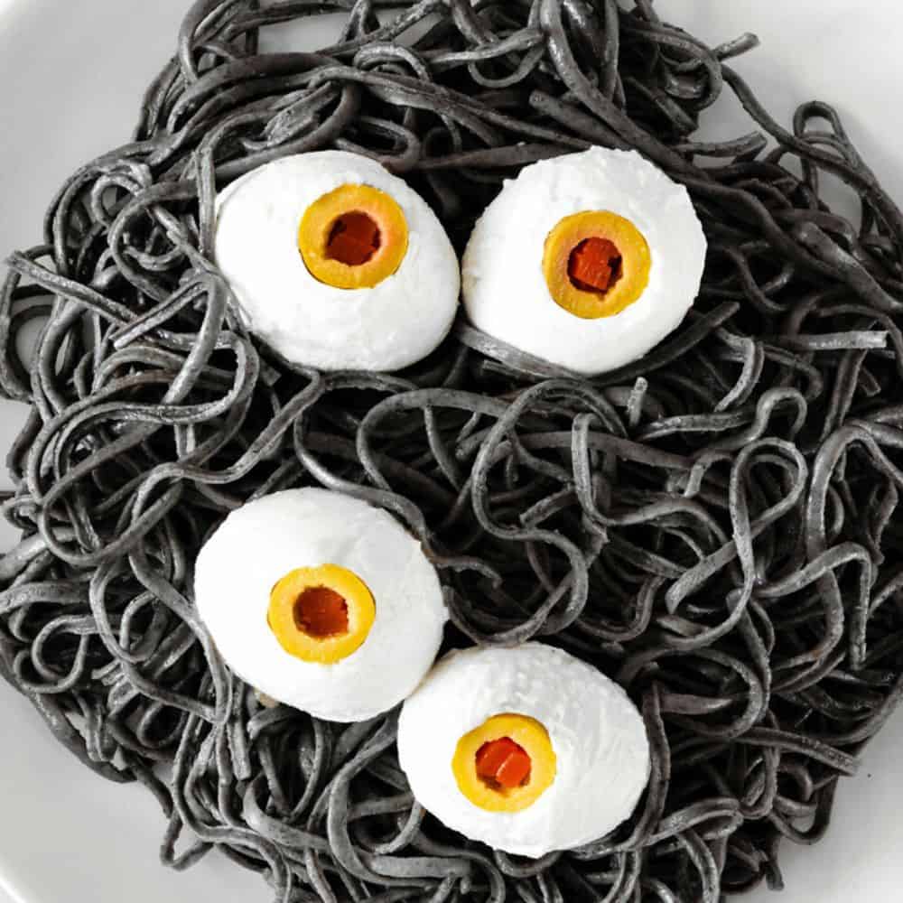 Halloween Mozzarella Eyes with Black Pasta 