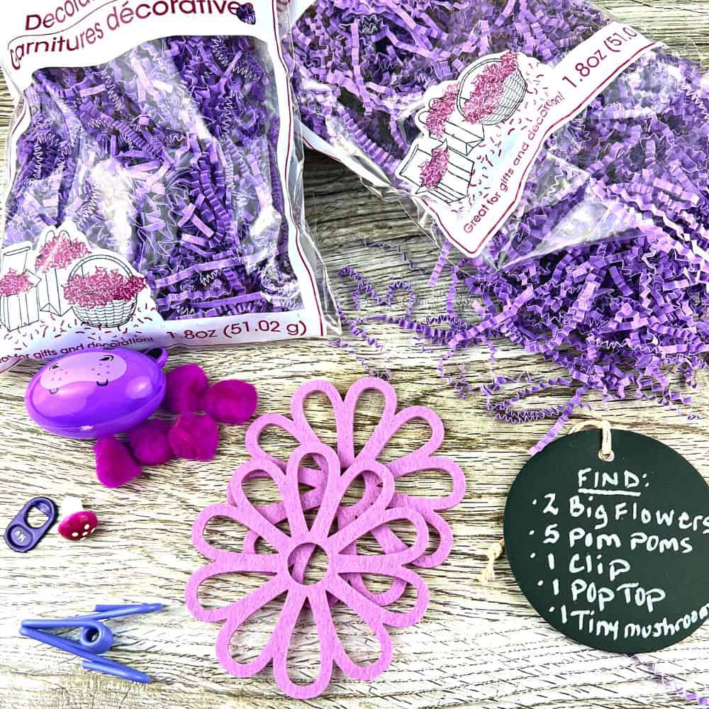 Ideas For Leftover Easter Grass purple Easter grass and purple items on a table top down view