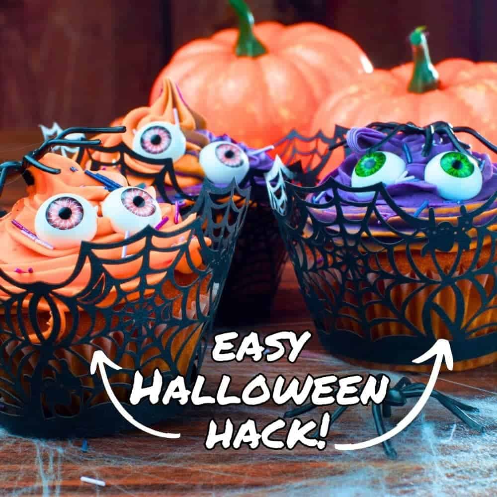 Store Bought Halloween Hack for Holiday Cupcakes - halloween cupcakes with eyes in spider web cupcake holders