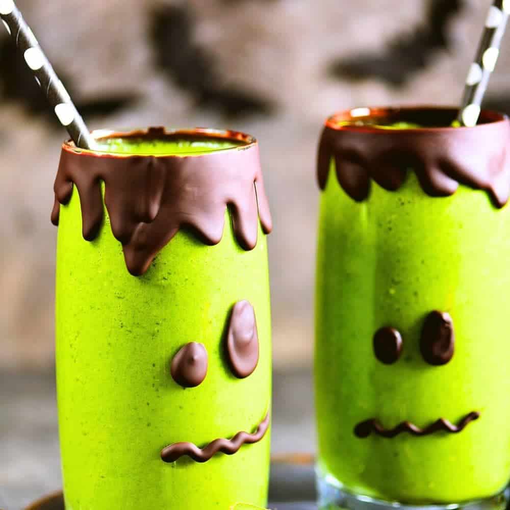 Green Monster Smoothie For Halloween that looks like a Frankenstein monster face