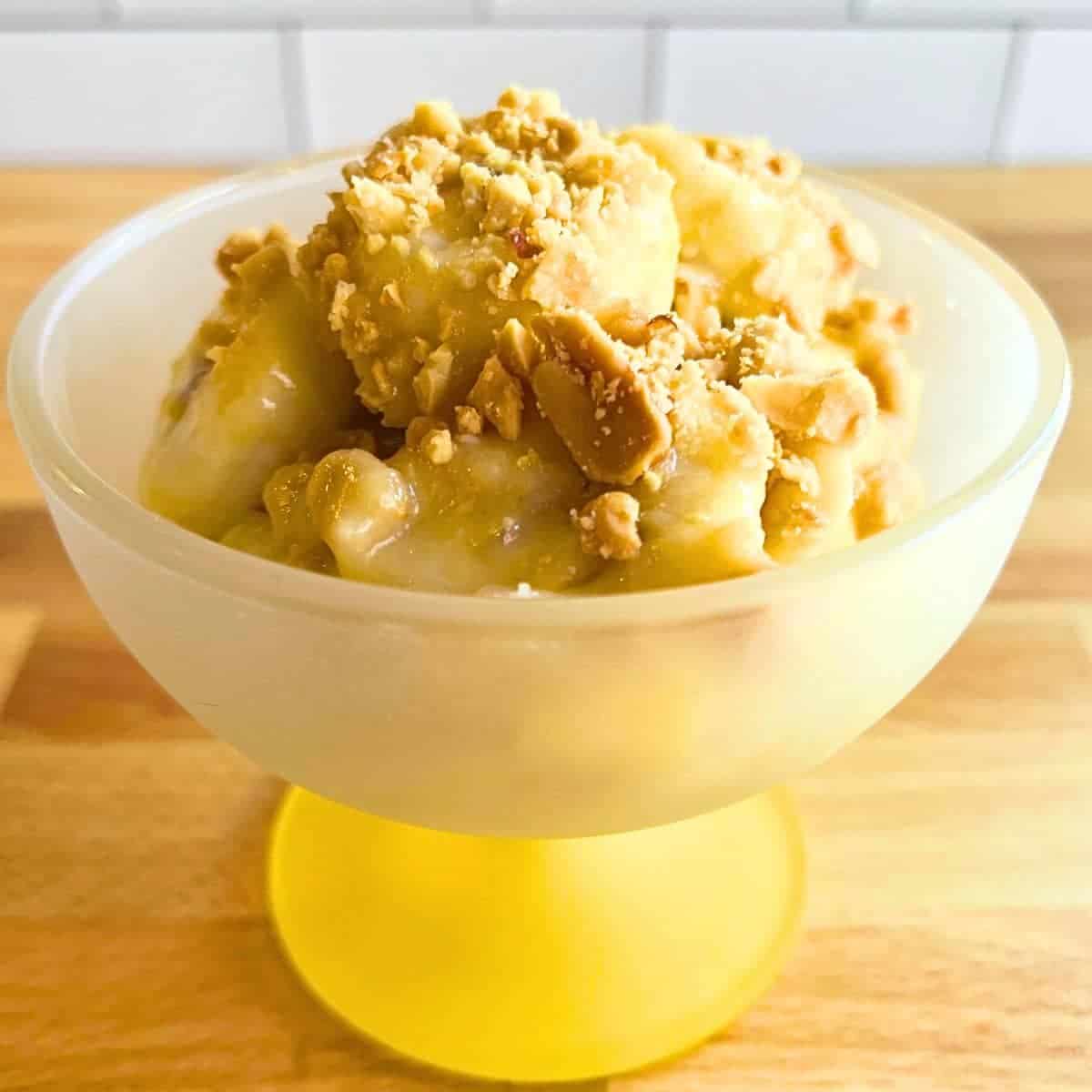 Banana Salads Ideas BANANA PEANUT SALAD IN A DESSERT DISH ON A COUNTER