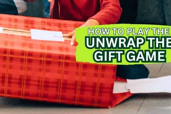 Christmas Unwrap the Gift Game FUN GAMES FOR HOLIDAYS child's hands unwrapping Christmas gift box for the pass the gift game