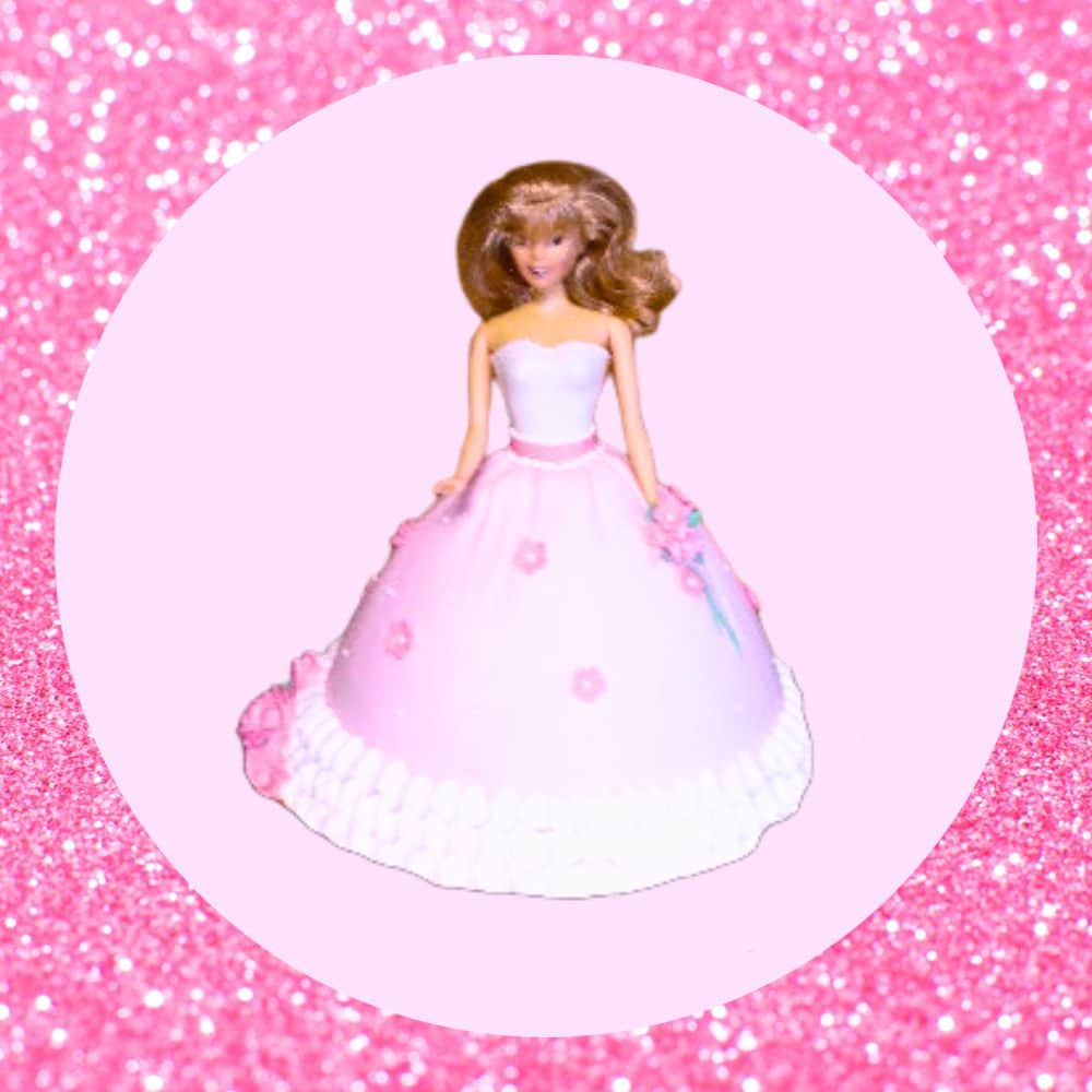 Pink Barbie Dress Cake Barbie Doll with a pink cake as the bottom of her dress