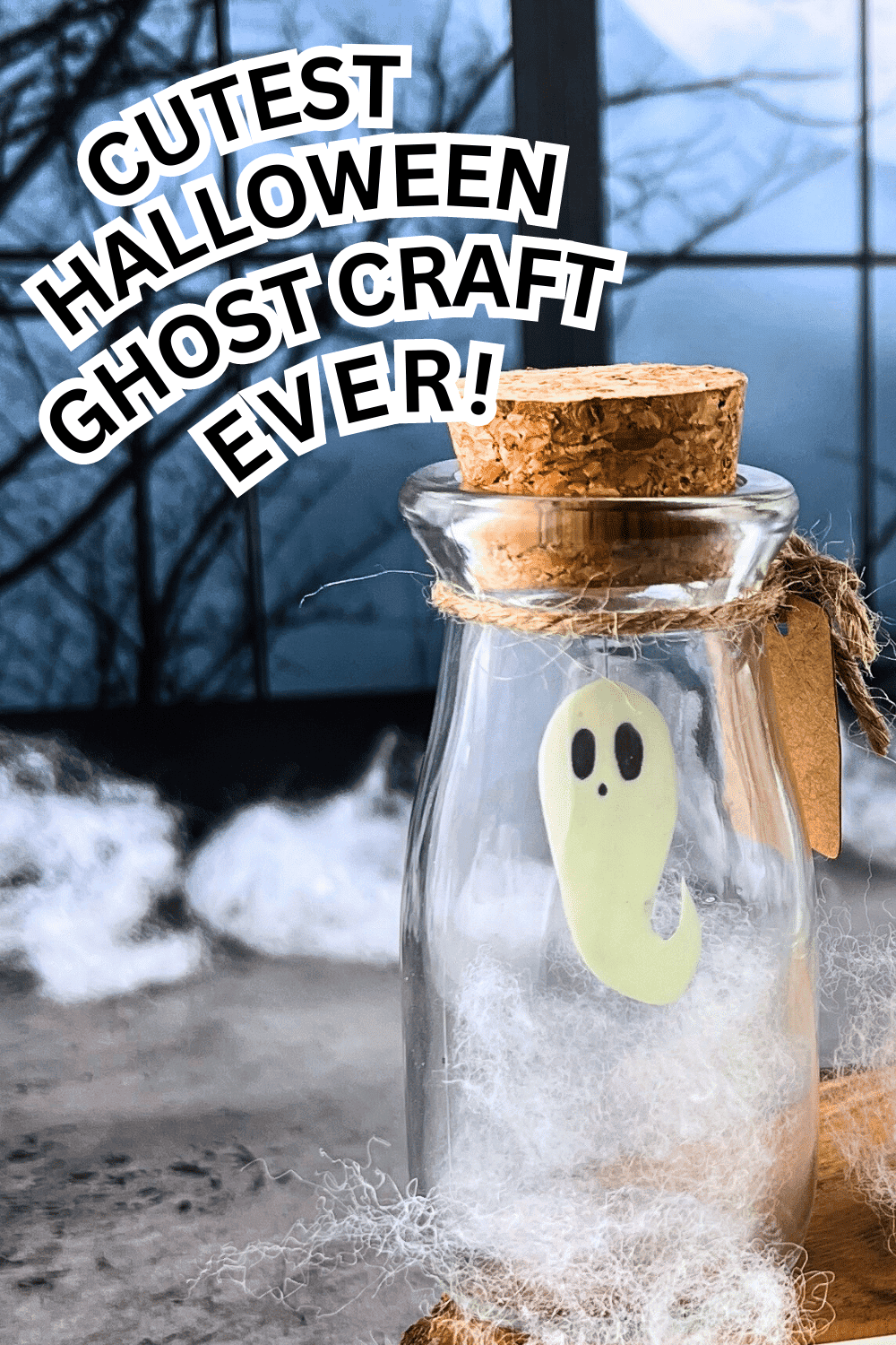 Cute Halloween Party Favor or Fun Halloween Decoration Ideas paper ghost floating in a small jar