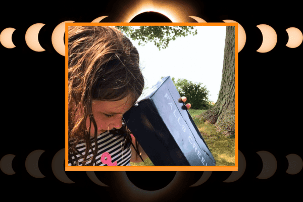 Easy DIY Shoebox Solar Eclipse Pinhole Viewer - solar eclipse pictures with child looking to a homemade shoebox viewer for eclipse viewing