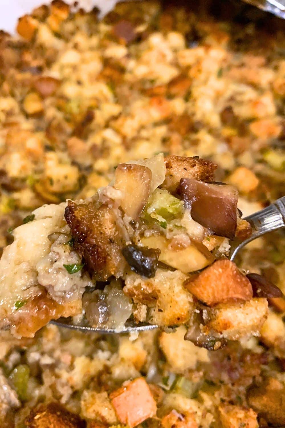 How To Make Homemade Dressing Step-By-Step - close up of turkey stuffing on a spoon