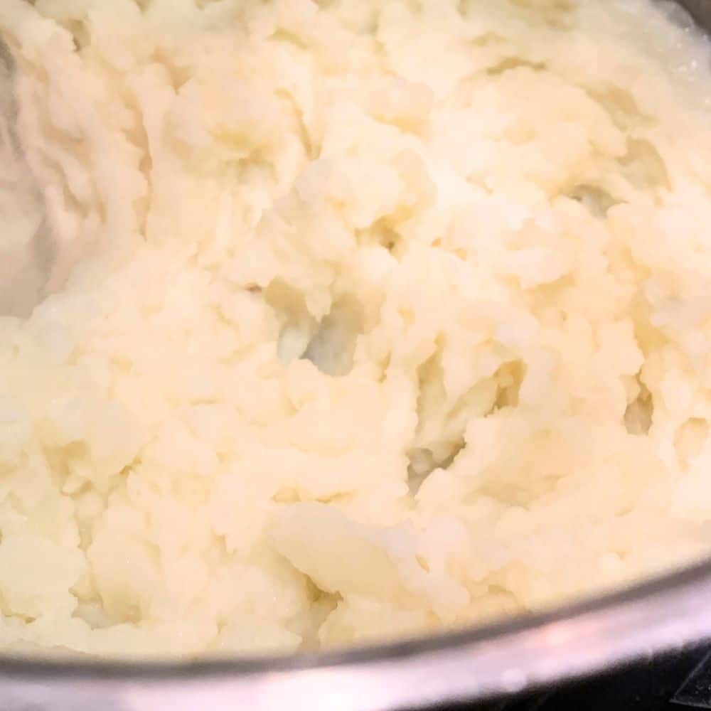 Making Leftover Mashed Potato Cakes or Potato Patties From Chilled Mash Potatoes - leftover mashed potatoes in a bowl