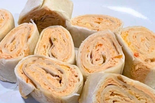 Easy Fiesta Roll Ups (Mexican Pinwheels Recipe) on a white plate