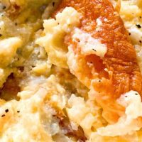Cheesy Hashbrown Breakfast Casserole Recipe Cheesy Hashbrown Breakfast Casserole Recipe in a white bowl with a fork in it