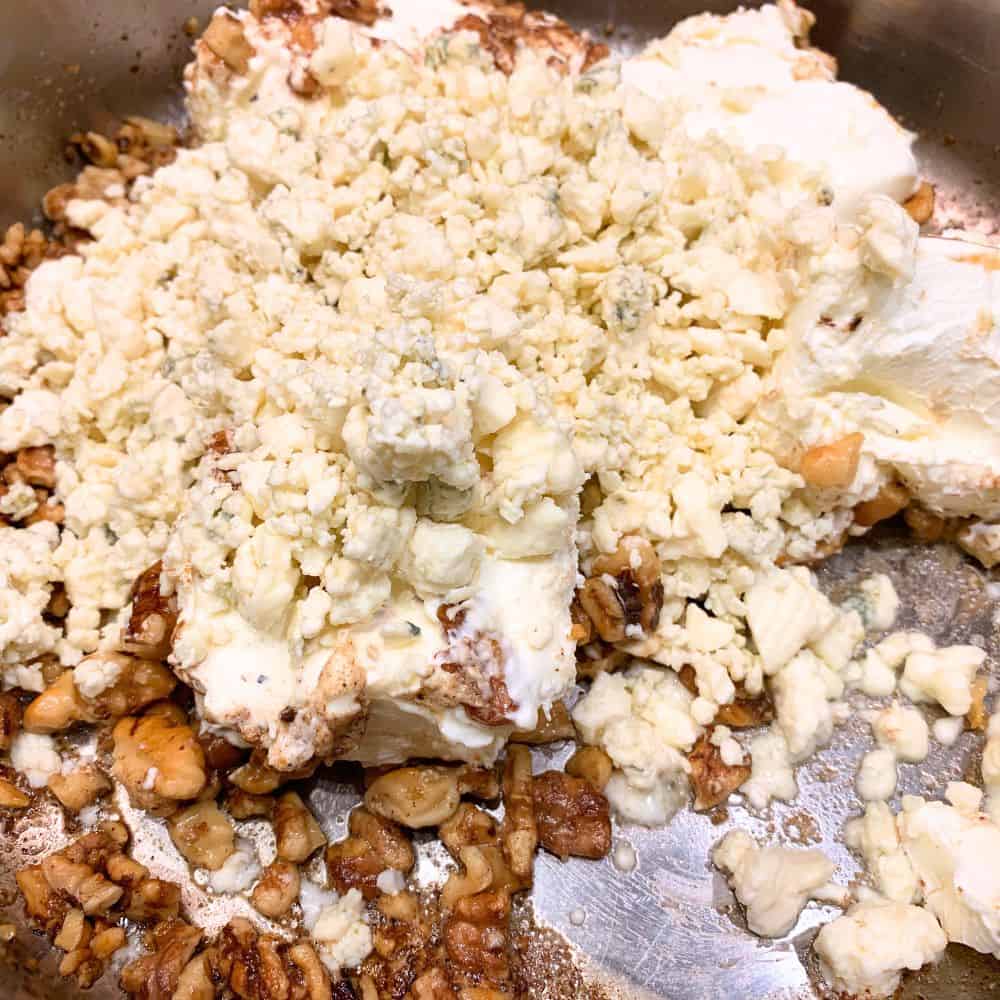 Warm Blue Cheese Dip with Cream Cheese and Toasted Walnuts in a pan