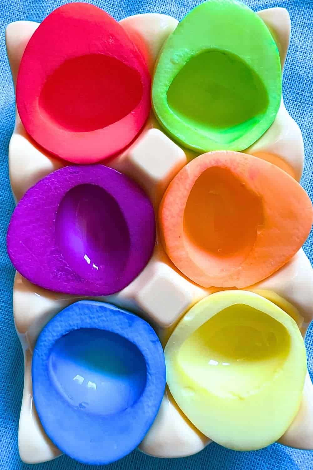 Color Dyed Egg Recipe EGG WHITES DYE - different colored egg whites sitting in an egg holder