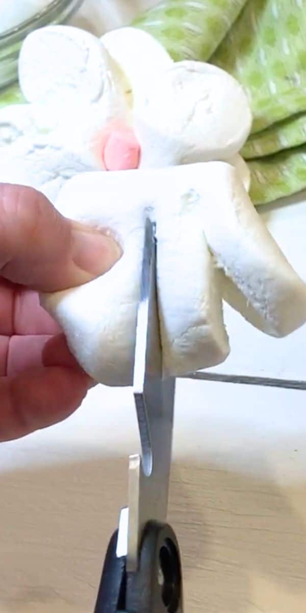 How To Make Flower Marshmallows Step 1 marshmallow being cut into a flower