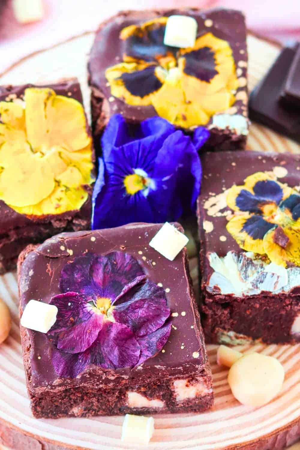Making Edible Flowers Brownies - brownies with flower pansies on a plate