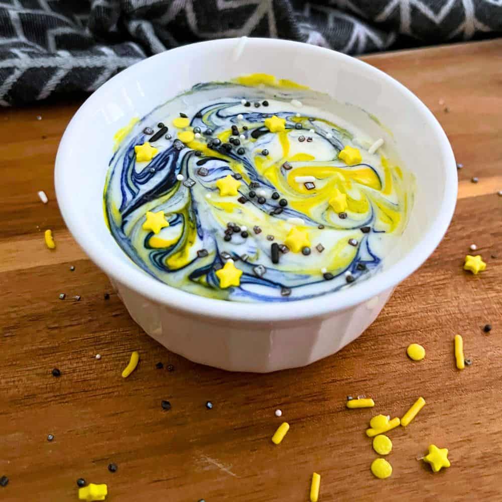 Swirled Fruit Dip Like Starry Night Painting on a table