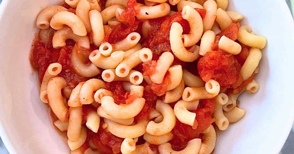 Grandma's Old Fashioned Macaroni and Stewed Tomatoes Recipe in a white bowl