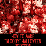 How To Make Red Bloody Halloween Popcorn For Halloween Party Treats - red drizzled popcorn (candy popcorn) with text over it and fake blood dripping down