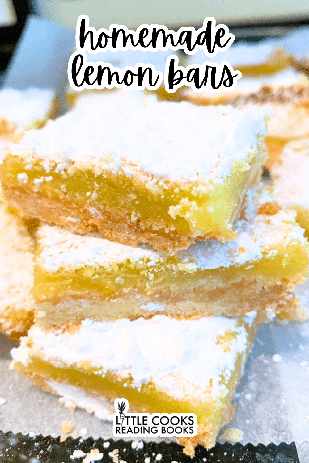 lemon squares stacked on top of each other on a party platter with text overlay homemade lemon bars recipe