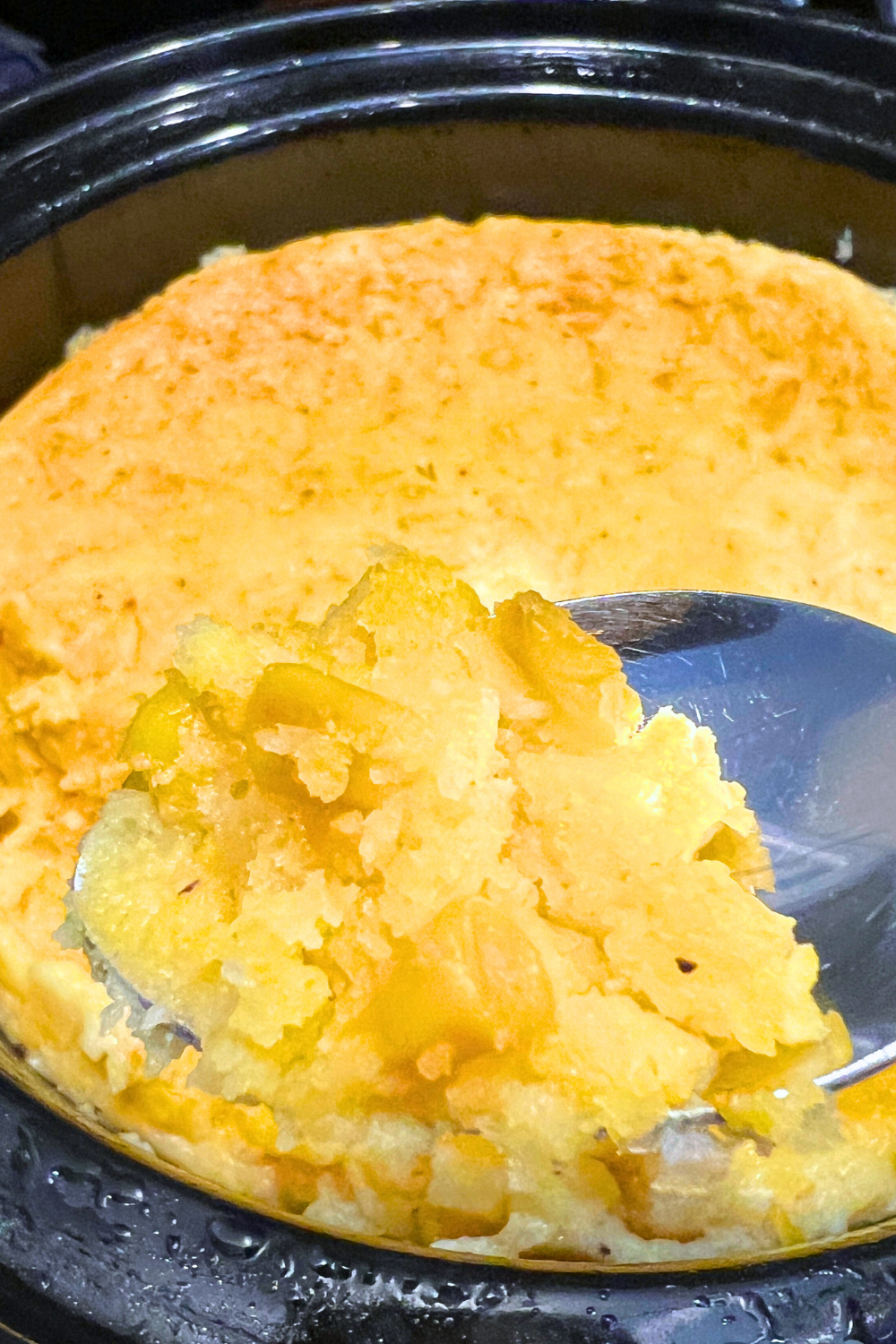 Crockpot corn pudding casserole in slow cooker