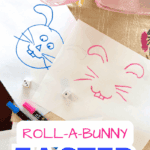 ROLL A BUNNY EASTER BUNNY DRAWING GAME WITH PARTY GAME SUPPLIES ON AN EASTER PARTY TABLE
