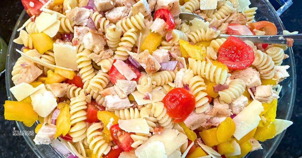 Chicken Bacon Pasta Salad in a serving bowl on a dinner table