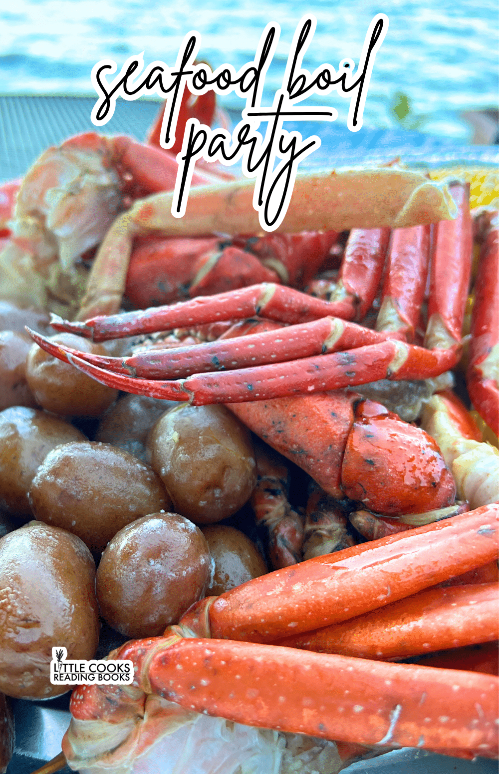 How To Do a Seafood Boil Party At Home seafood boil party with crab legs, potatoes, shrimp and corn on a seafood platter in front of water